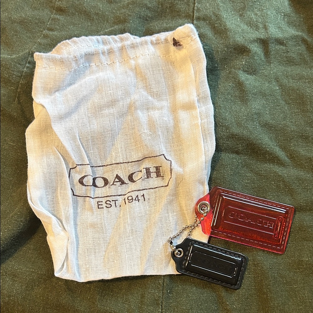 Two Coach Hangtags with a Coach Dust Cover